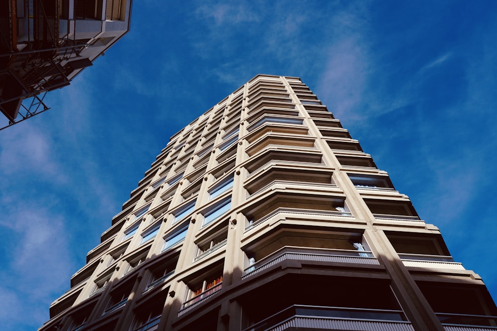 a tall building with a blue sky