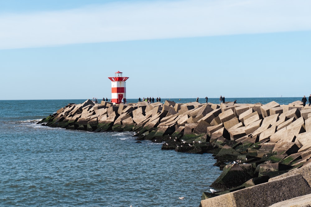 a lighthouse on a rocky cliff