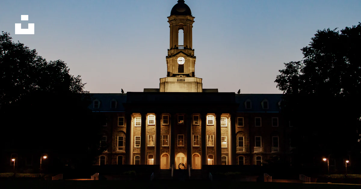 Penn State Image A large building with a clock tower photo – Free Penn state university ...