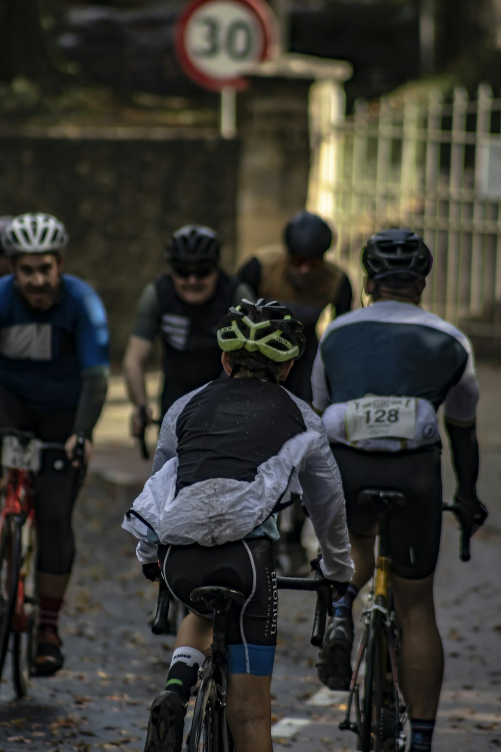 a group of people riding bikes