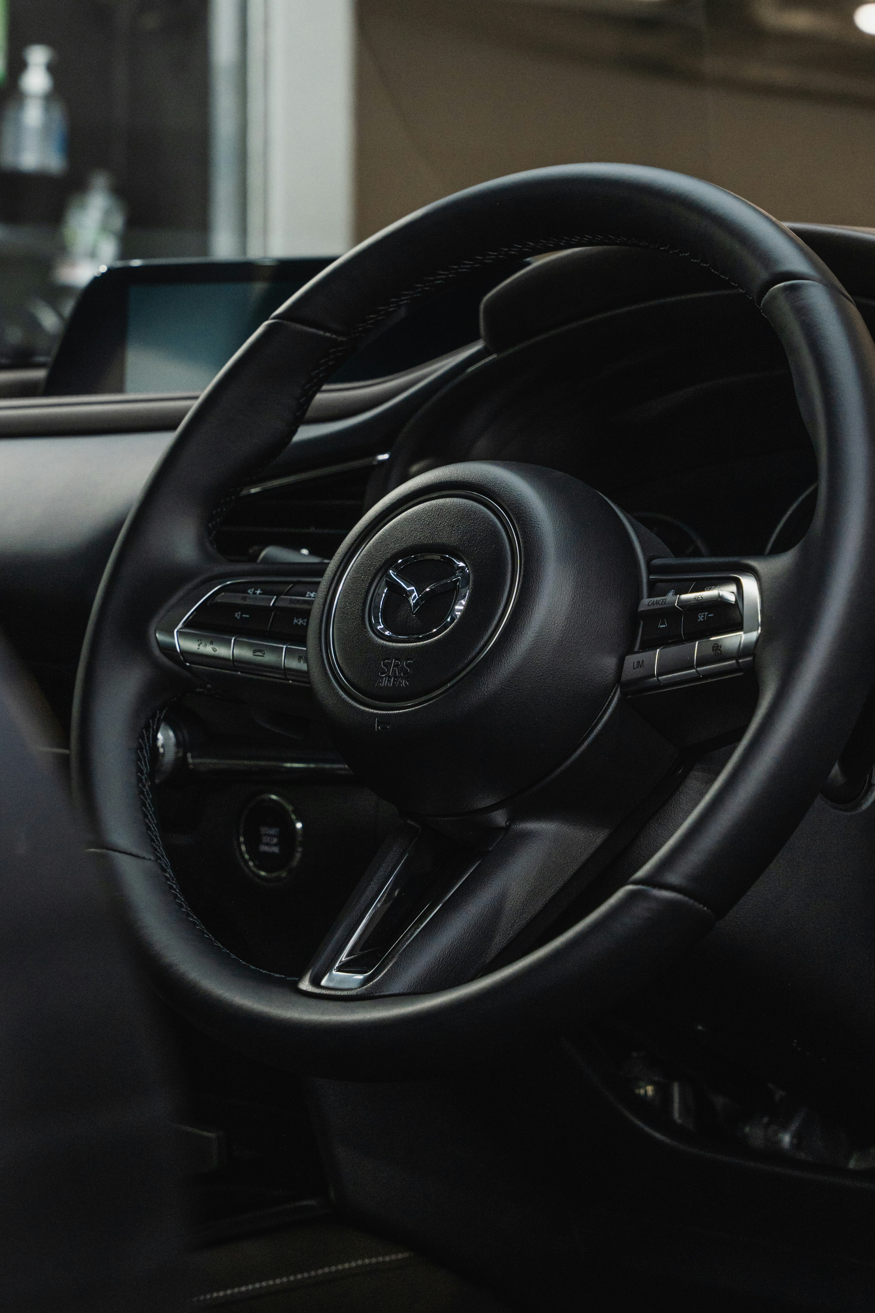 a steering wheel and dashboard of a car