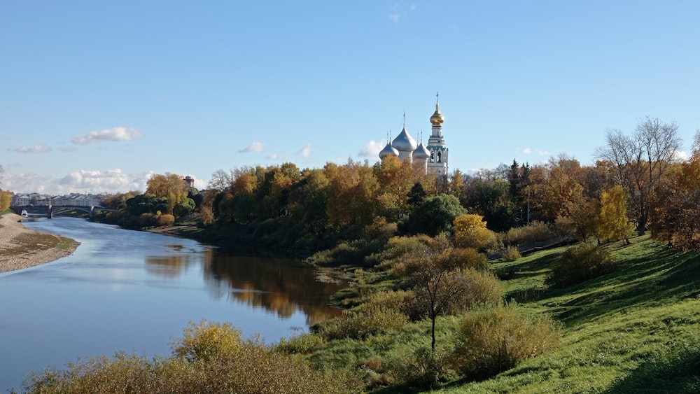 a river with a building in the background