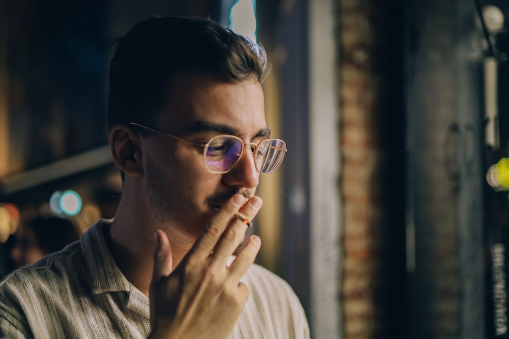 a man smoking a cigarette