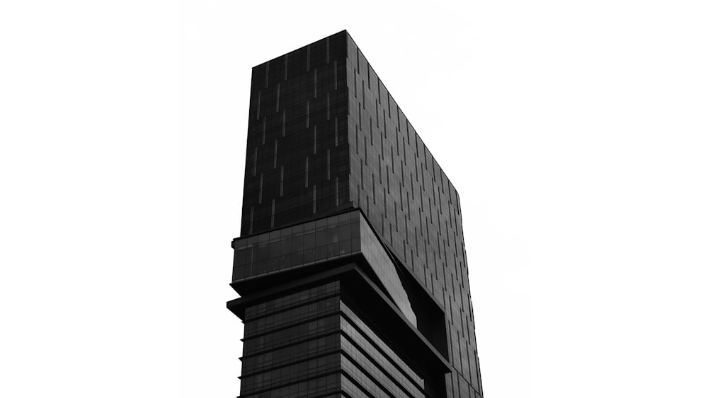a tall building with a white background