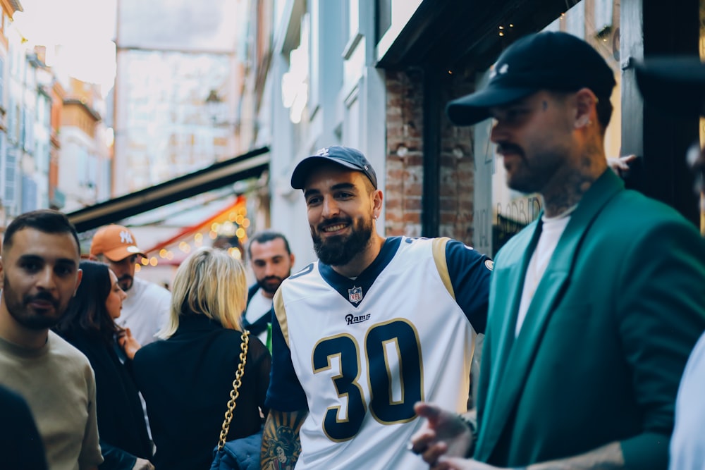 a couple of men in sports uniforms