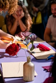 a vase of flowers on a table
