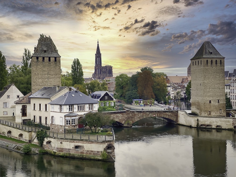 a bridge over a river with buildings on either side of it