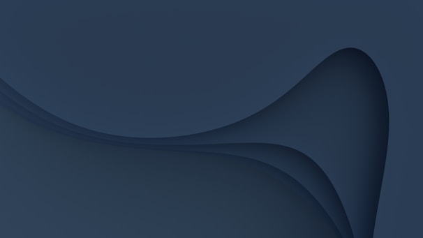 An abstract, deep blue gradient with soft, flowing light patterns suggesting underwater stillness.