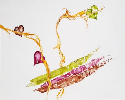 Abstract watercolor painting with swirls and splashes of vibrant colors, featuring flowing yellow-orange lines intertwined with heart-shaped elements in green, purple, and brown shades.