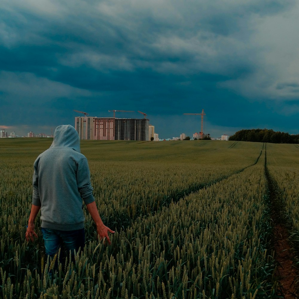 a man walking in a field