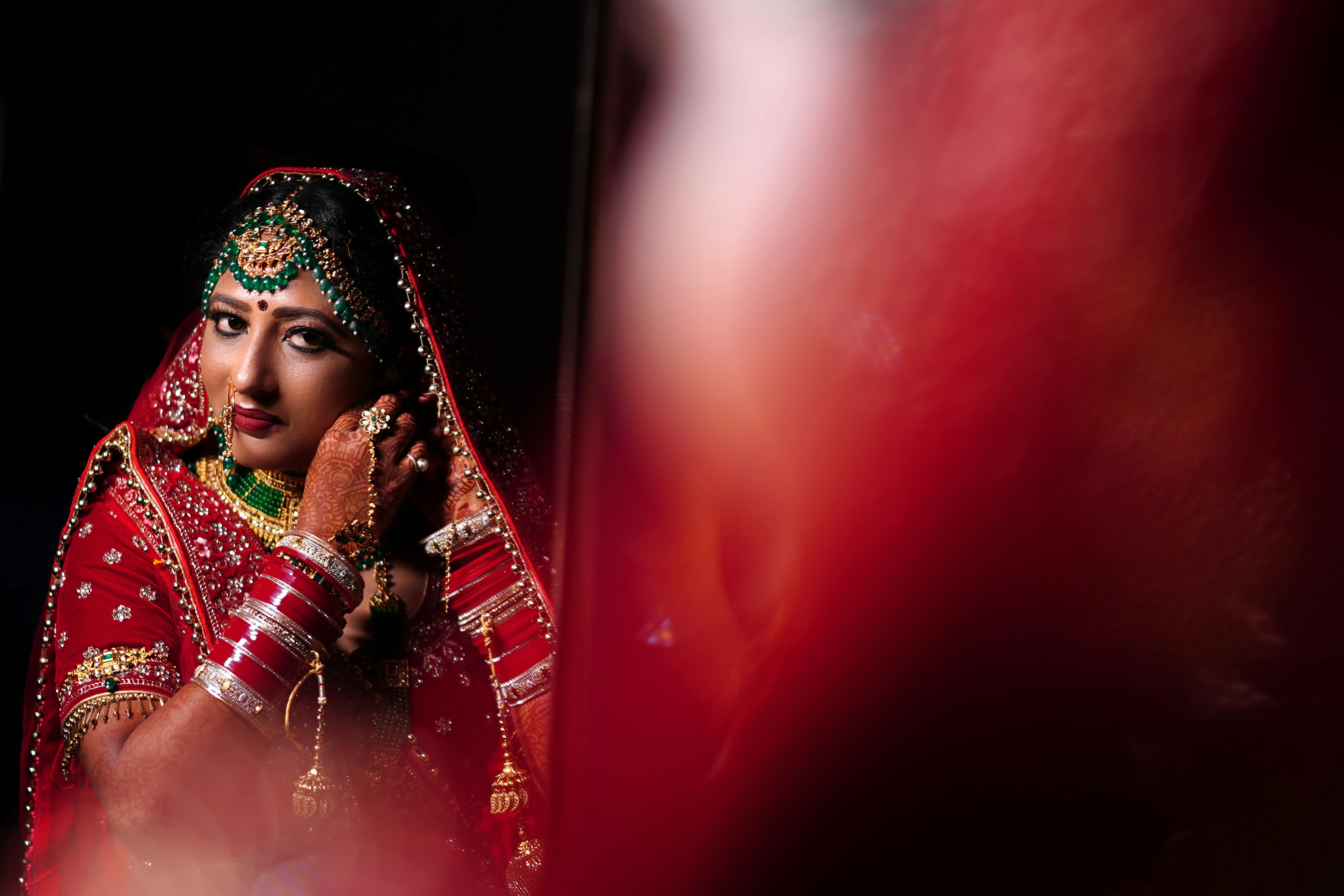 INdian Bride in red Saree get ready for wedding