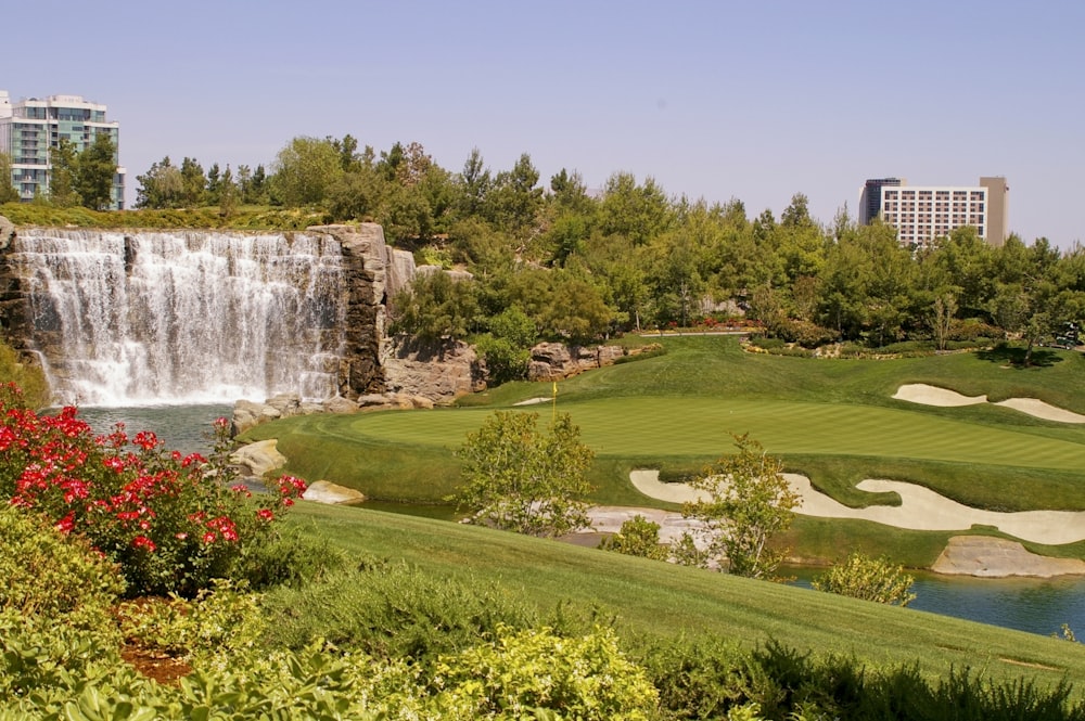 a waterfall in a golf course
