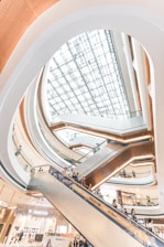 a large glass dome with people walking around