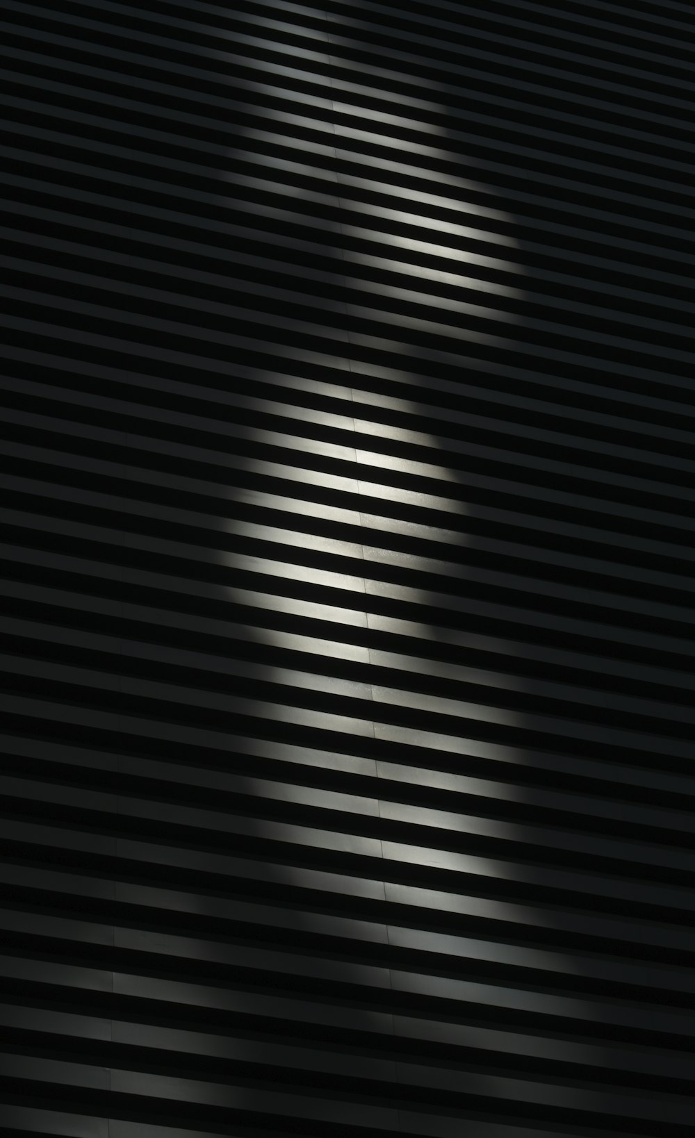 a close up of a black and white striped surface