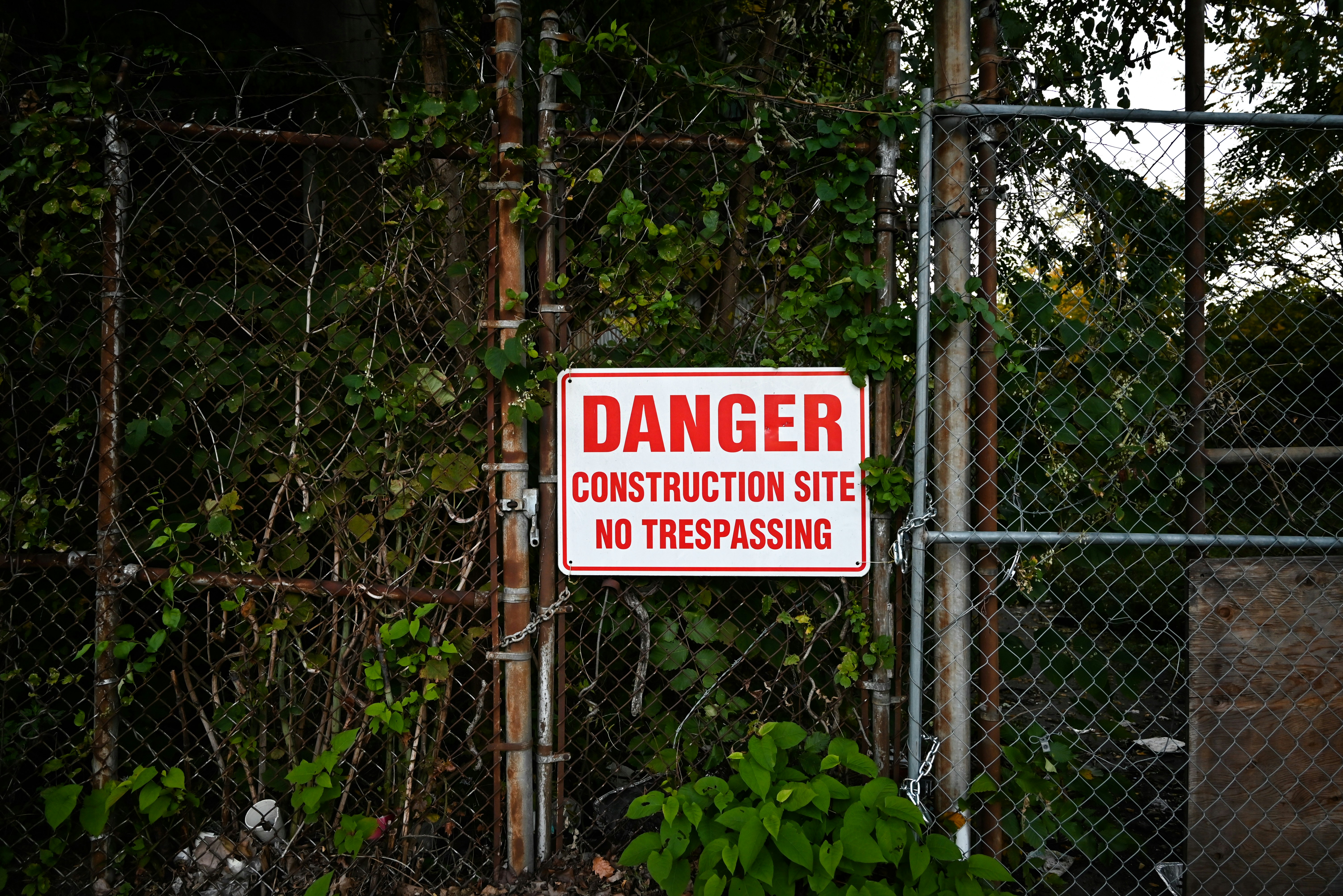 a sign on a fence