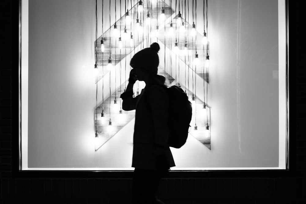 a person standing in a hallway