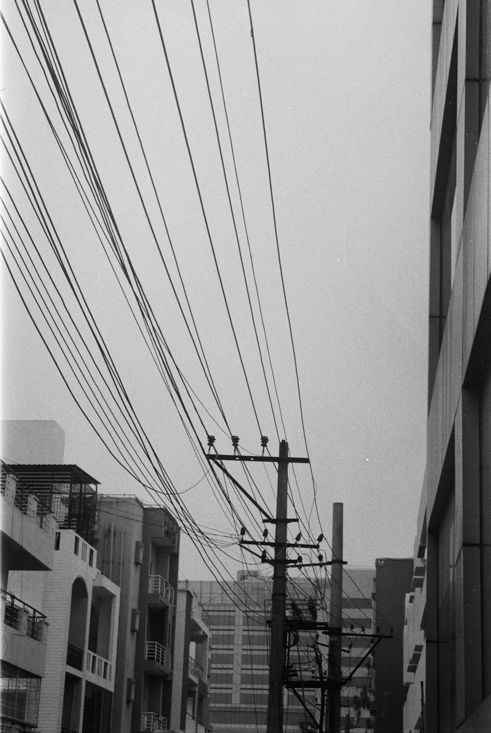 a group of buildings with wires