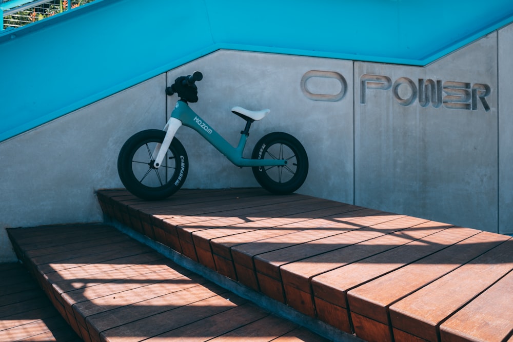 a bike parked on a wall