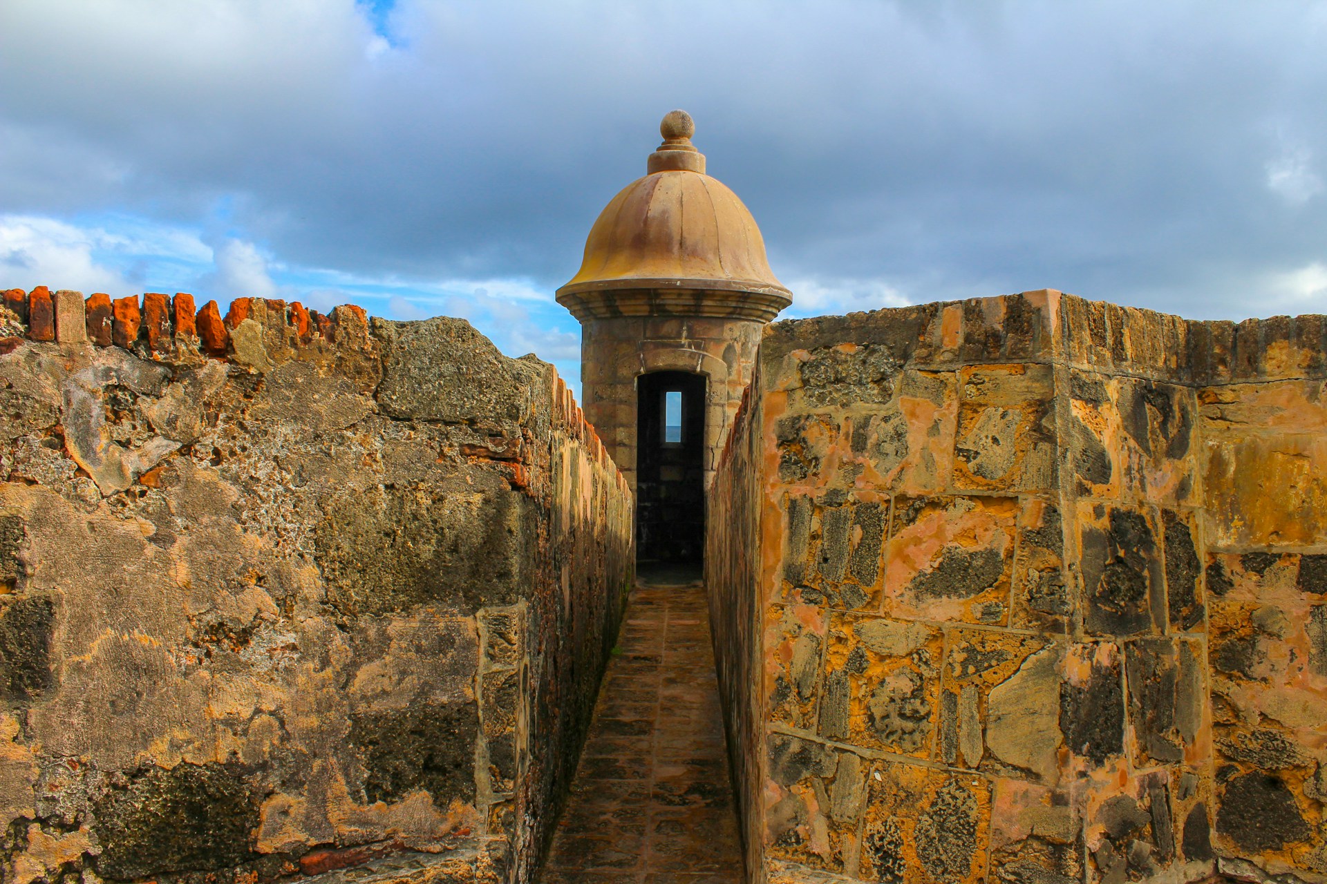 a stone wall with a domed roof