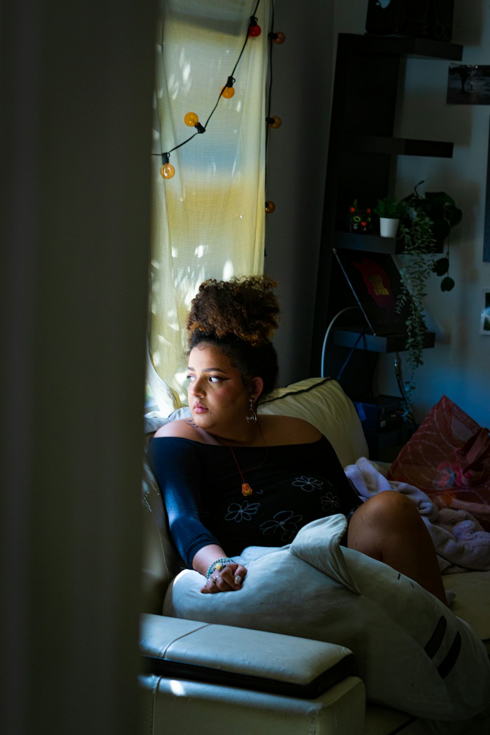 a person sitting on a bed