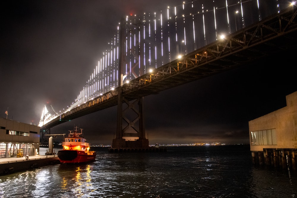 a boat under a bridge