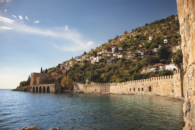 a town on a hill by the water