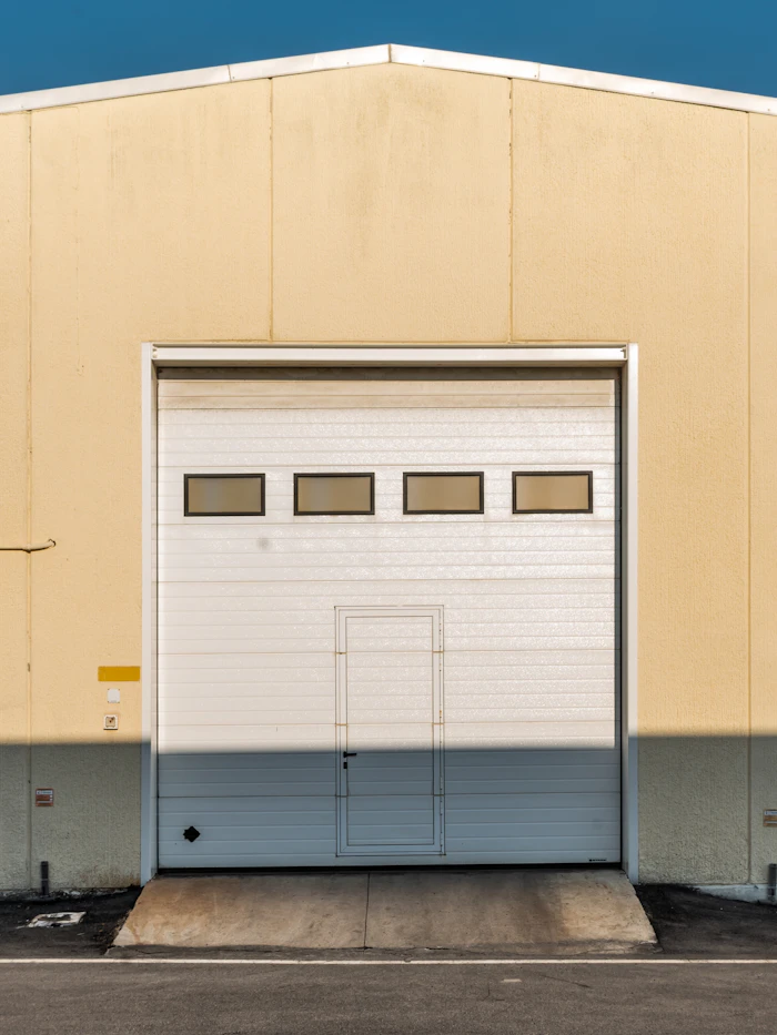 Garage door with a window on a modern building