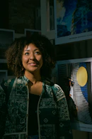 a woman with curly hair