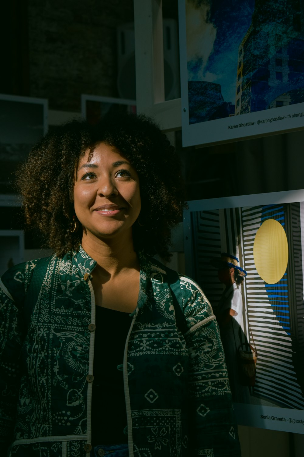 a woman with curly hair