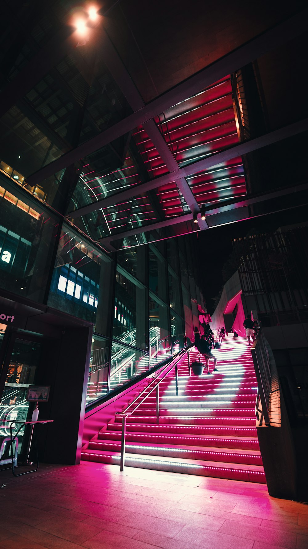 a red staircase in a building