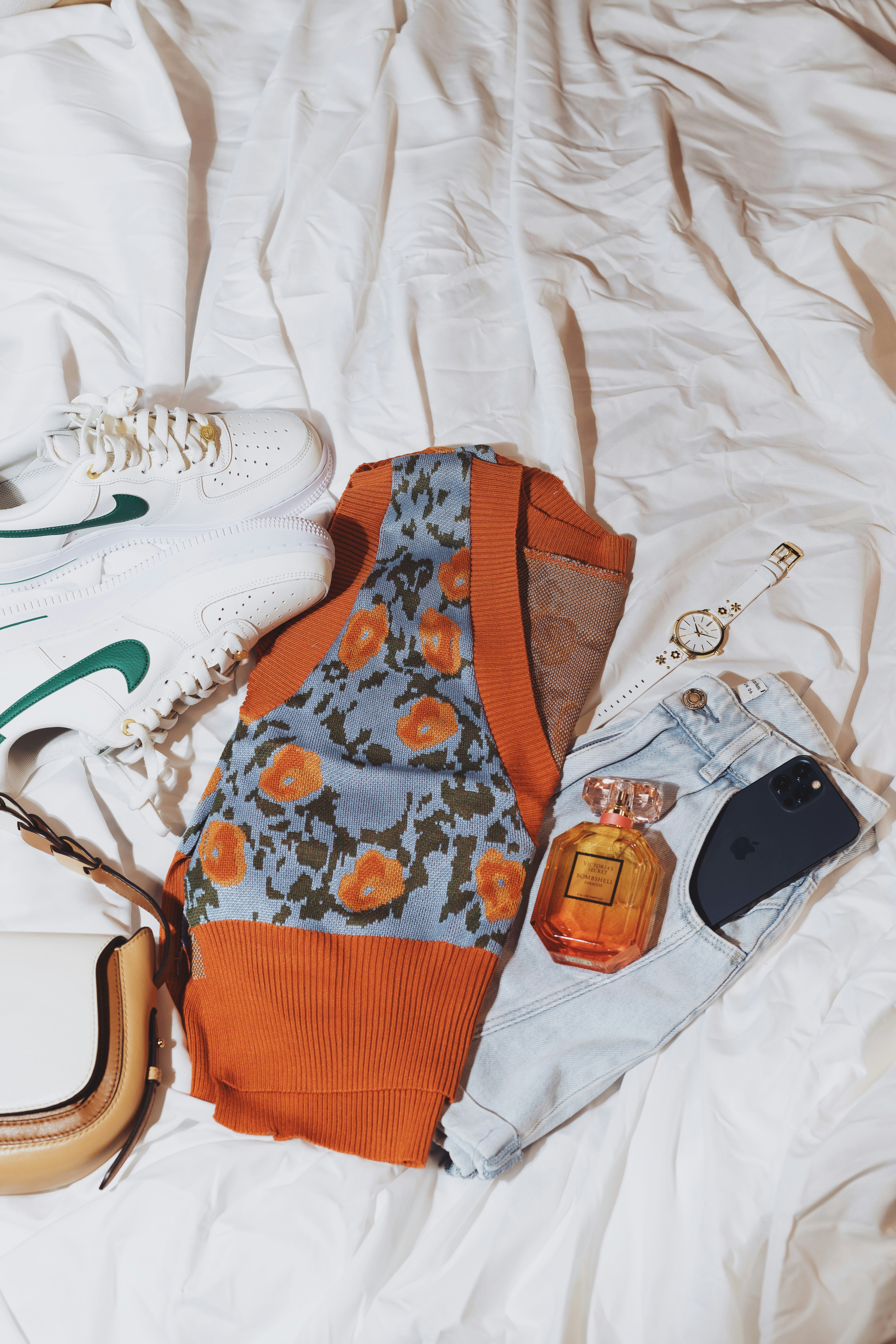 a pair of shoes on a bed