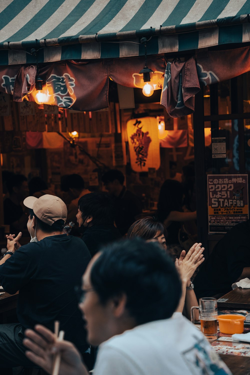 a group of people sitting at a table