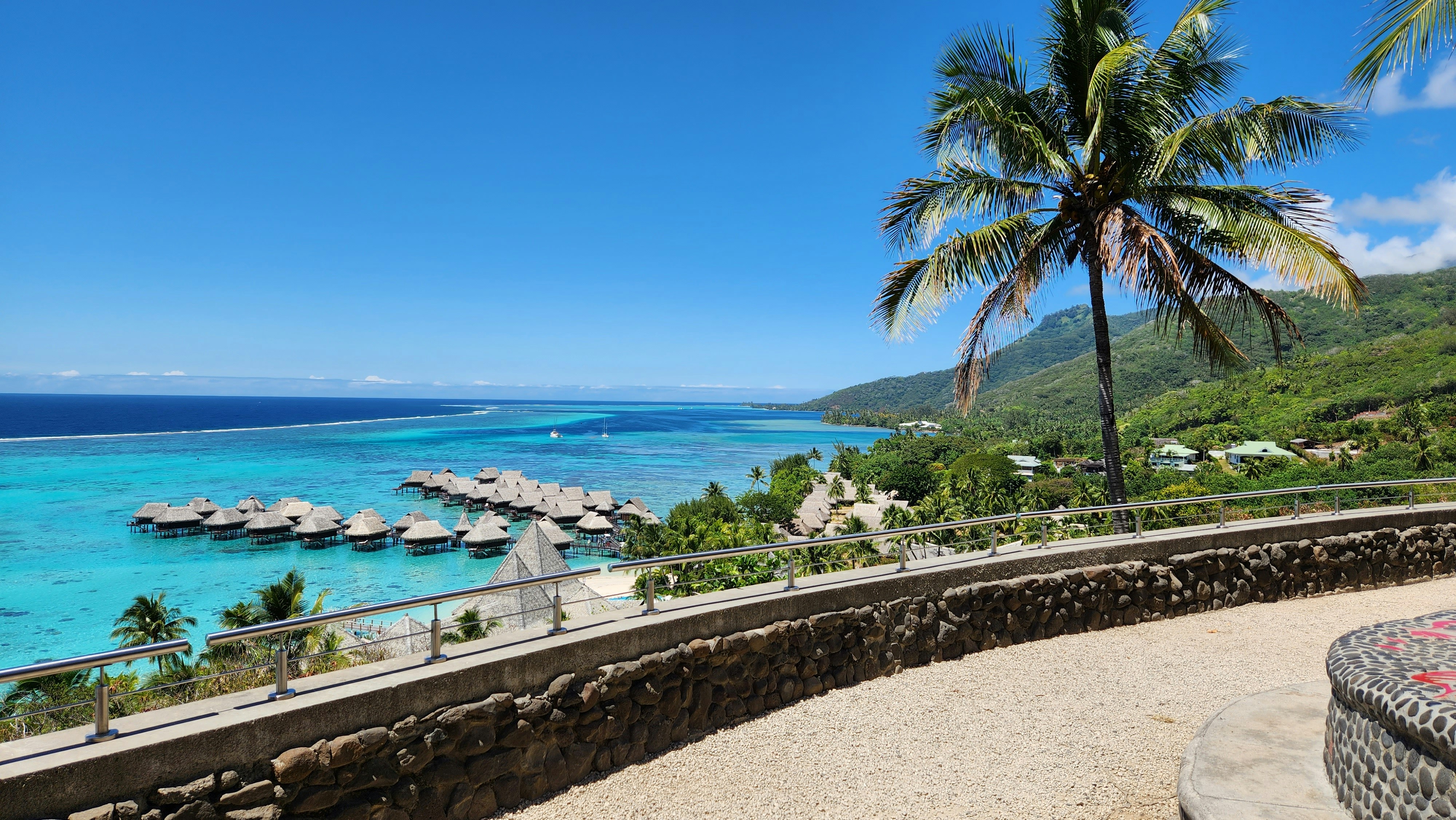 Maldives overwater bungalows turquoise lagoon bright daylight
