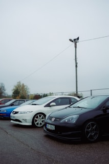 a group of cars parked on a road