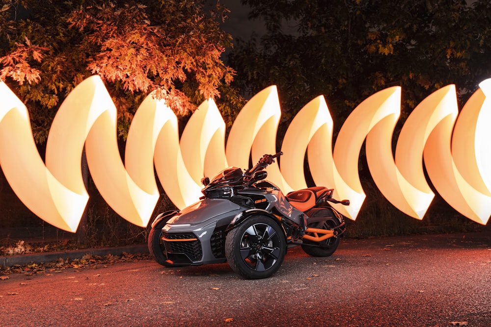 a motorcycle parked in front of a bunch of bananas