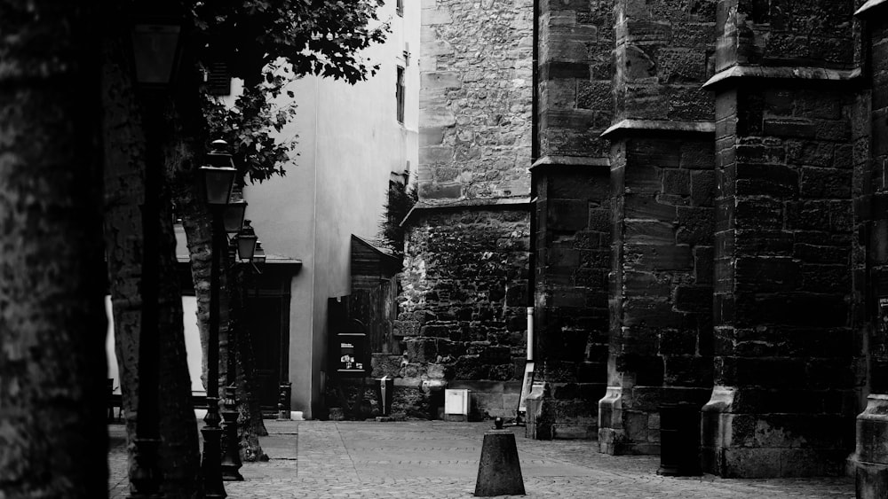 a stone building with a brick walkway