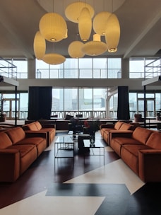 a large room with a large chandelier and a large window