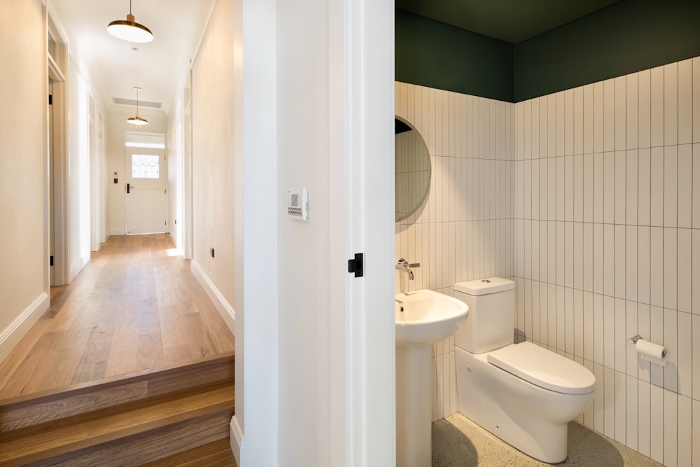 a bathroom with a toilet and sink