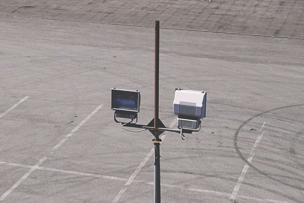 two chairs on a pole