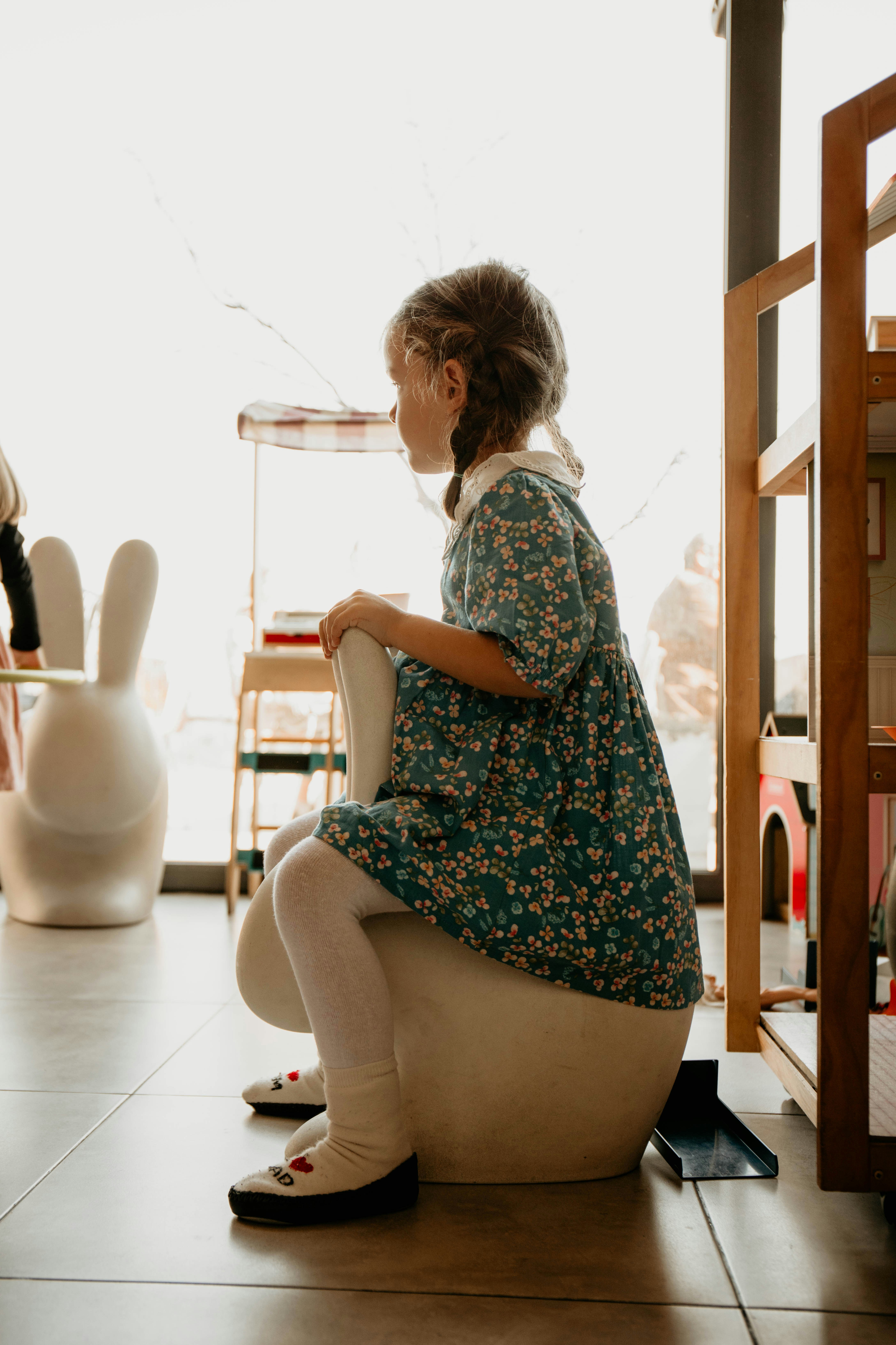 a woman sitting on the floor