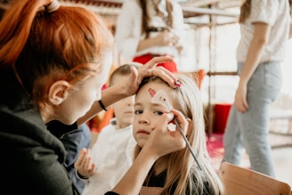 a person holding a child