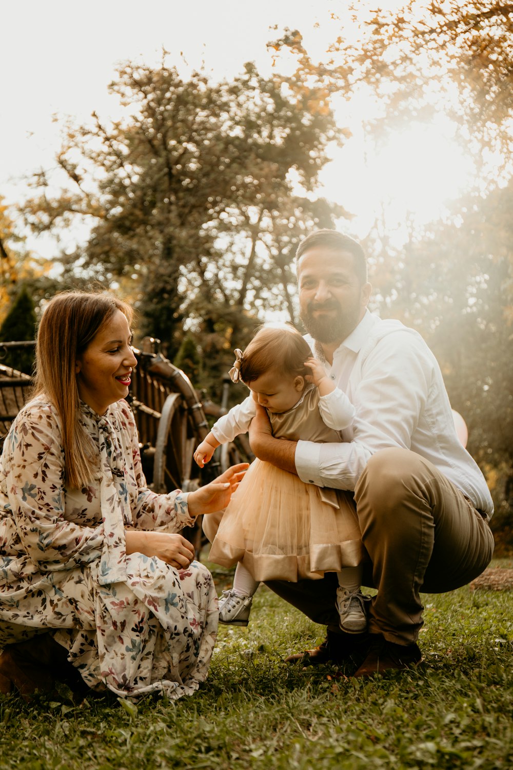 a man and woman with a child