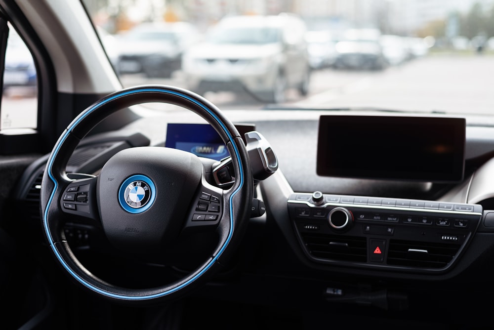 a steering wheel and dashboard of a car