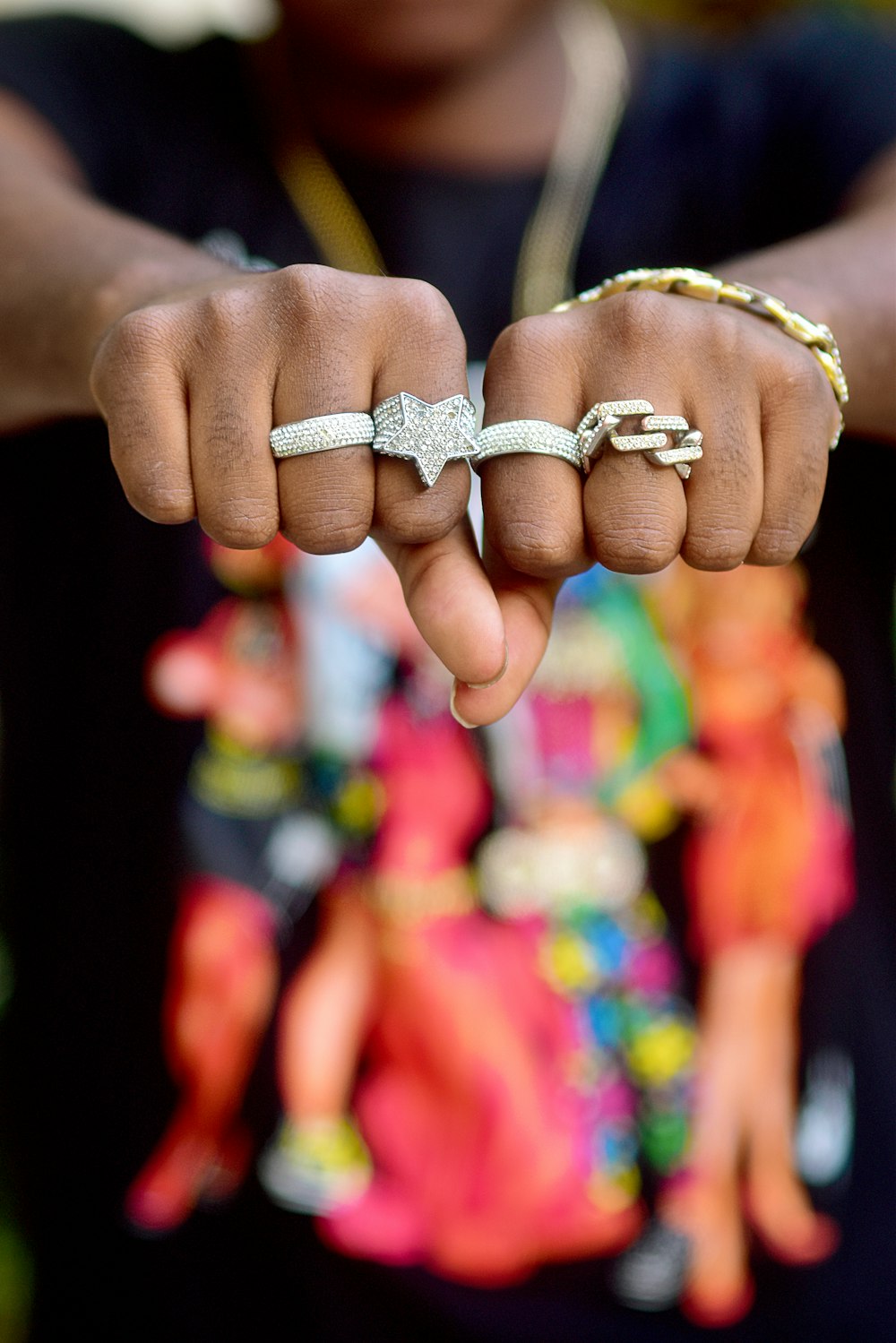 close-up of hands holding a ring