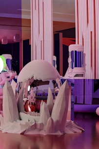 A futuristic interior space with large vertical light panels and colorful ambient lighting. The setup includes a spherical metallic object with a reflective surface surrounded by crystalline structures. A humanoid figure is visible near the object, contributing to a sci-fi theme.