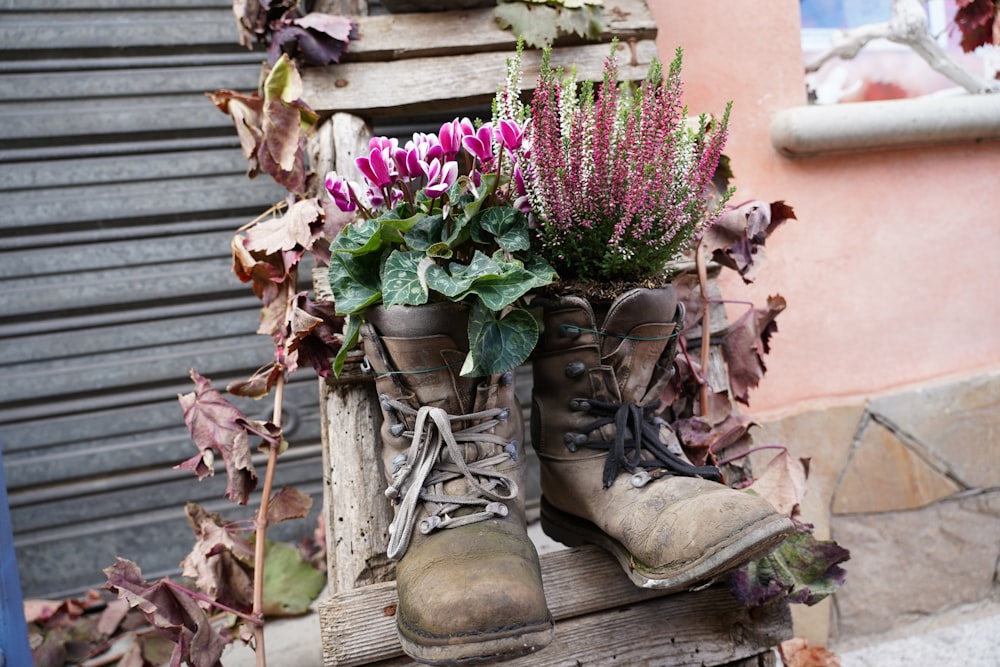 a pair of boots with flowers