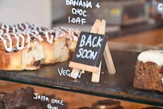 a group of pastries on a black surface
