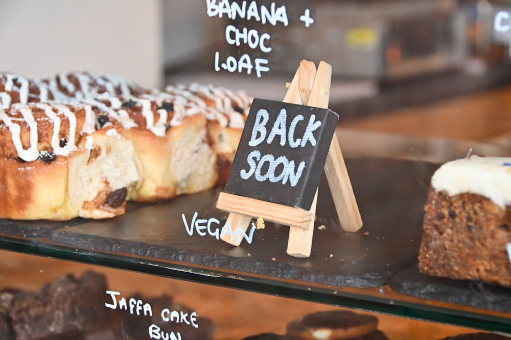 a group of pastries on a black surface