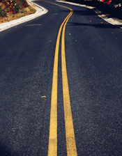 a road with yellow lines