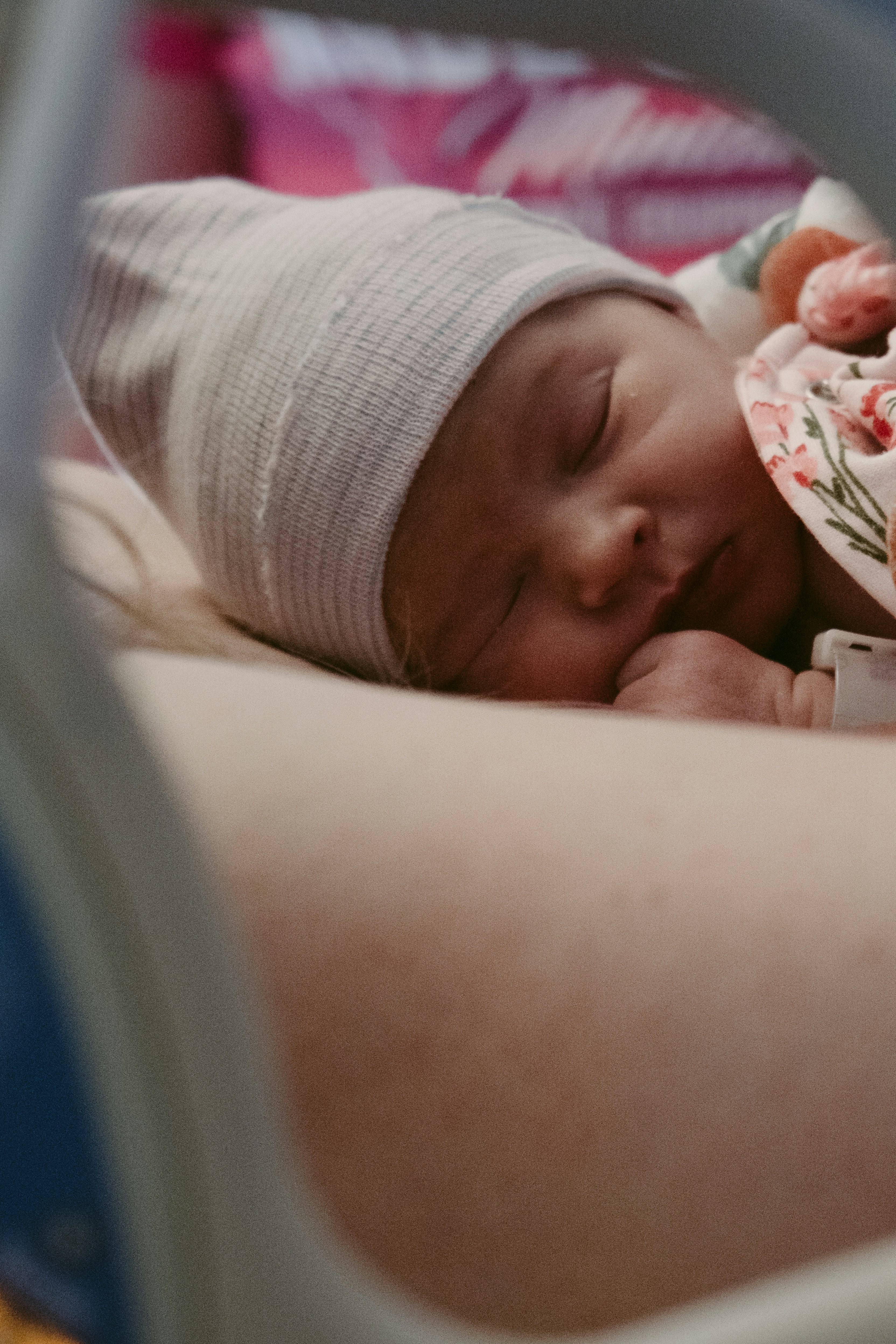 a baby sleeping in a blanket